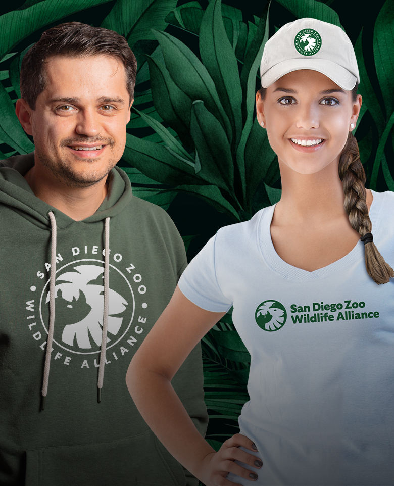 two people wearing wildlife alliance t-shirts