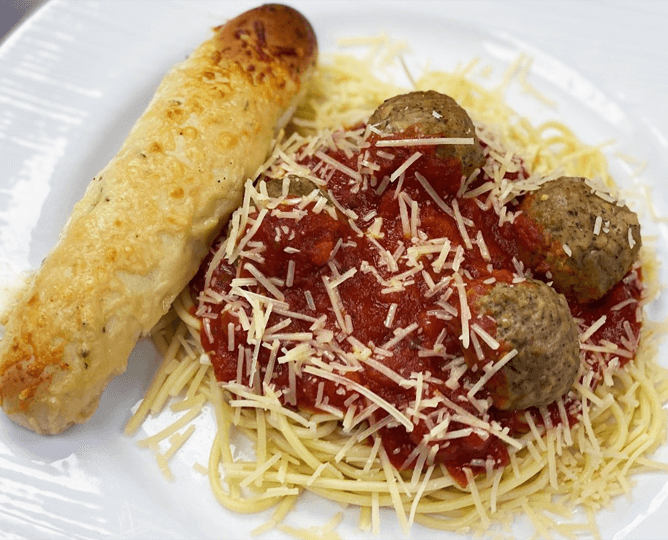 Spagetti with meatballs and a breadstick - Treetops cafe.